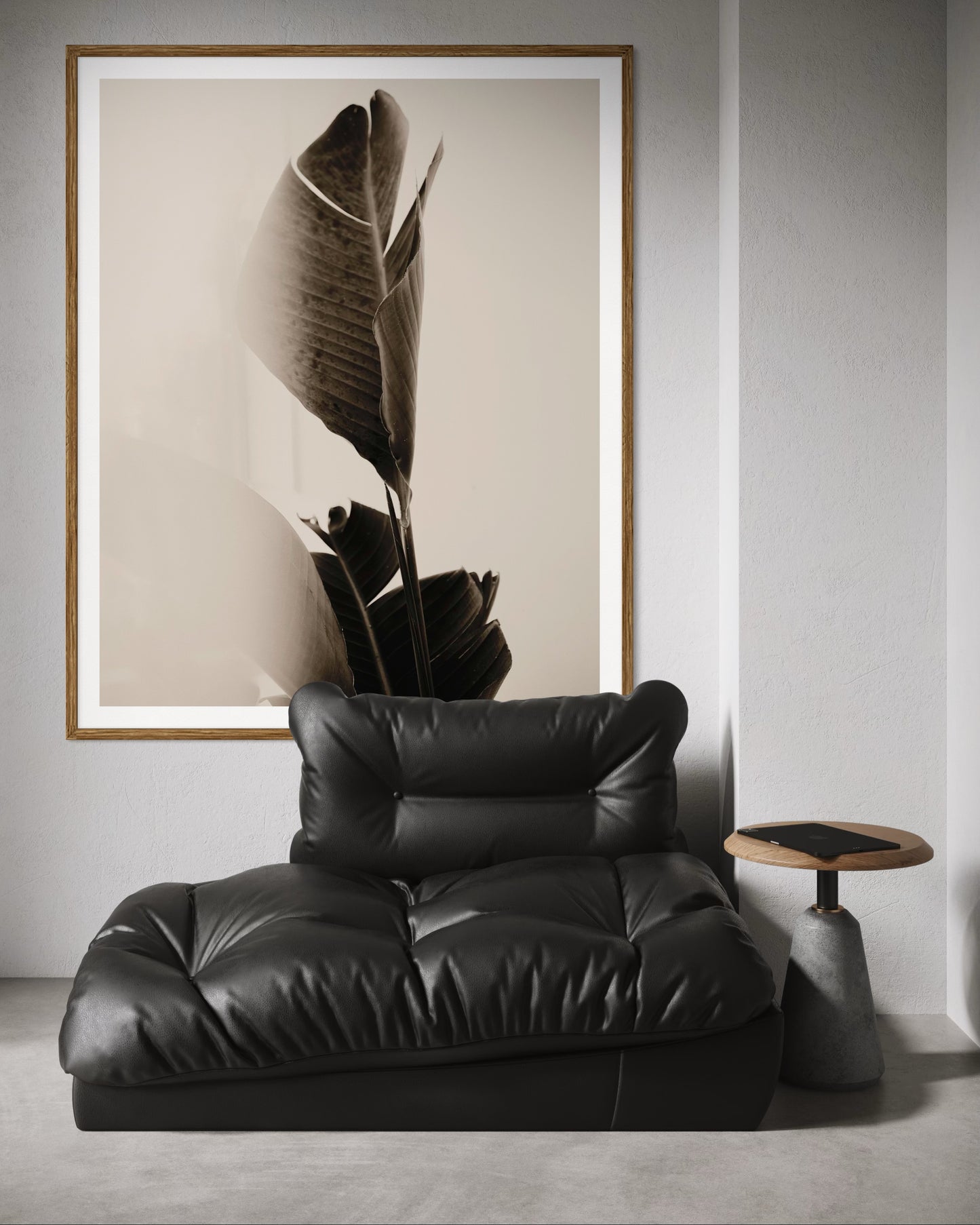 Minimalistic interior featuring framed artwork of a close-up of tropical leaves in black and white by Francoise V Fine Art Gallery in Cape Town, South Africa. 