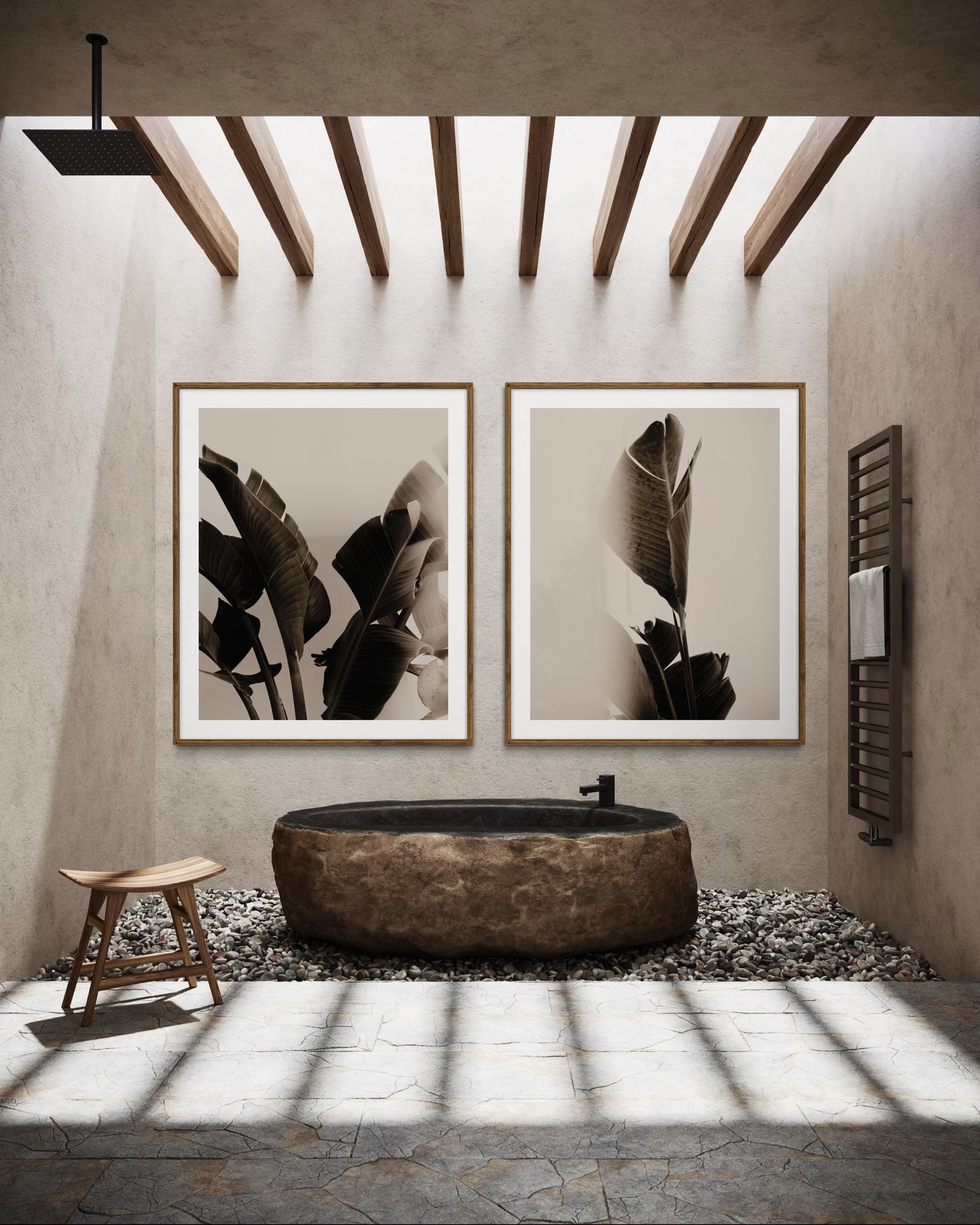 Earthy bathroom interior with a stone bathtub, framed botanical tropical art, by Francoise V Fine Art Gallery in Cape Town, South Africa.